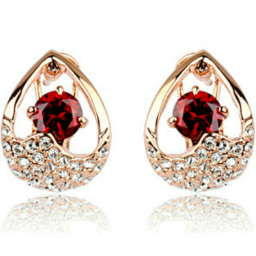 Red omega back earrings with rose gold finish