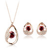 Red jewellery set with rose gold finish