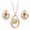 Jewellery set with gold colour cubic zirconias