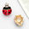 Rose gold finish red ladybird earrings