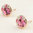 Rose gold finish pink stud earrings