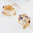 Rose gold finish purple omega back earrings