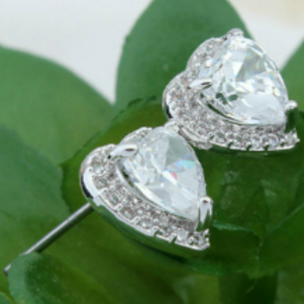 White Gold finish heart stud earrings with clear cubic zirconias
